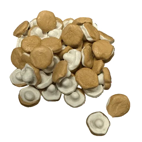 Pile of brown and white round candies on a white background