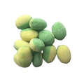 Green and yellow striped candies on a white background