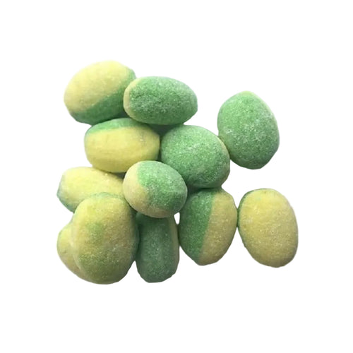 Green and yellow striped candies on a white background